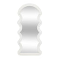 Miroir à bords ondulés avec cadre blanc
